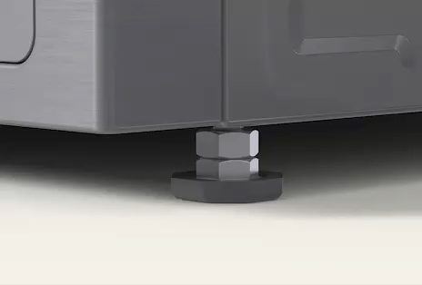Close-up of an adjustable Washing Machine foot with an anti-vibration pad ensuring stability and balance.