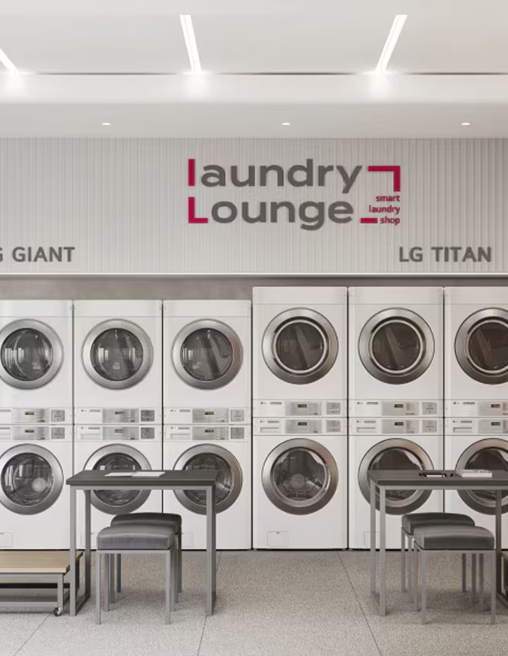 Laundry Lounge interior showcasing LG Giant and LG Titan washer dryer lineup in organized layout