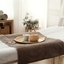 Spa treatment room with clean towels and calm interior, representing premium laundry quality	
