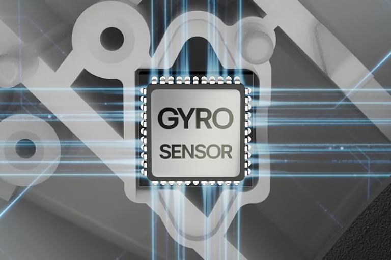 Gyro sensor chip illustration showing vibration detection technology inside commercial laundry equipment	
