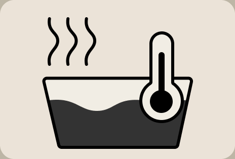 LG washing temperature guide icons showing warm washing settings with thermometer and fabric symbols