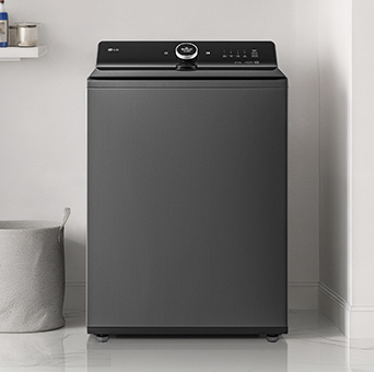 A top-loading washing machine is located in a multi-purpose room with a modern interior on the white floor