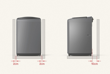 LG top load washer shown with clearance space around the unit for ventilation and lid access.