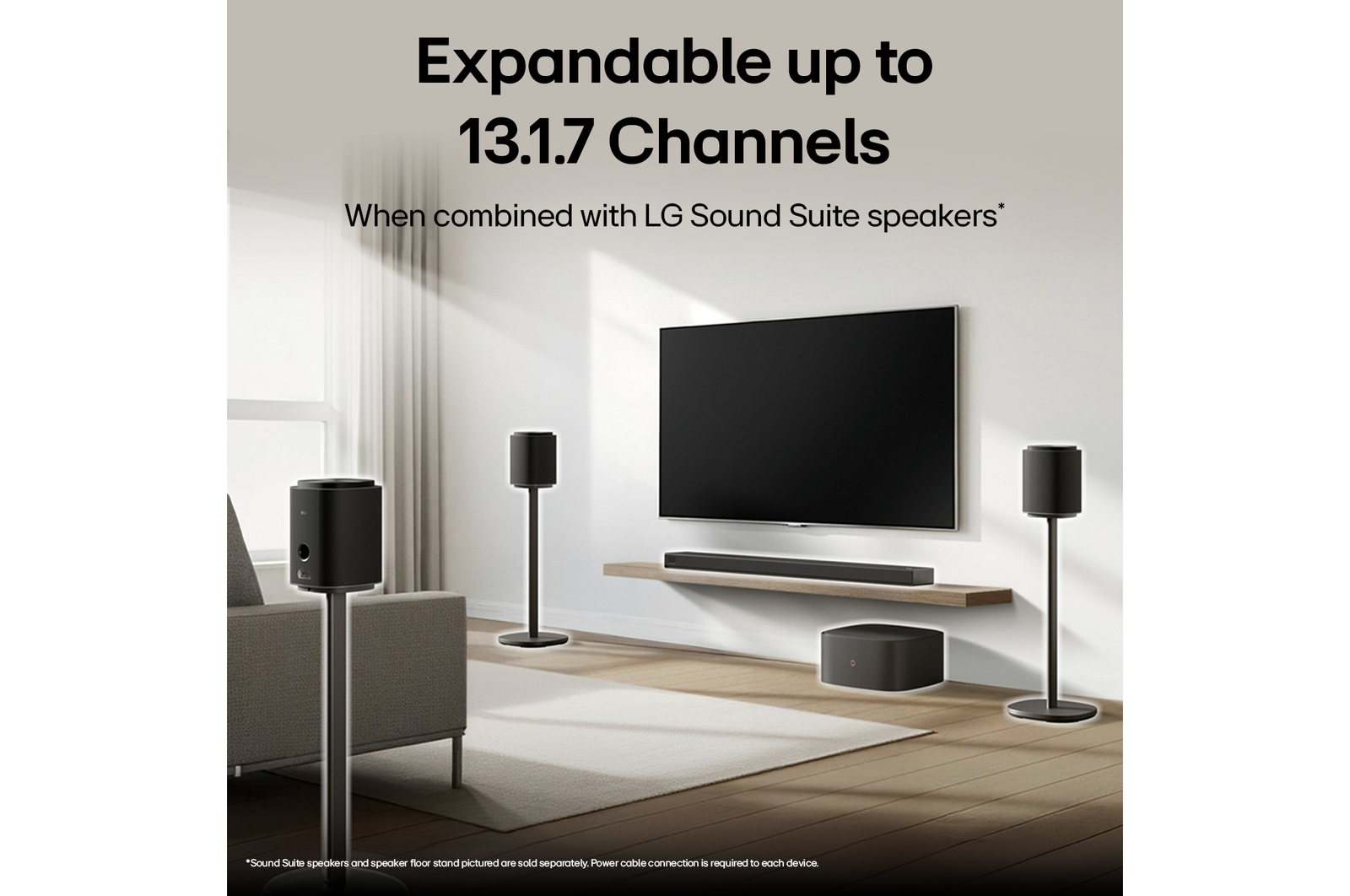 LG Sound Suite placed in a living room, demonstrating flexible speaker placement for an immersive home sound system