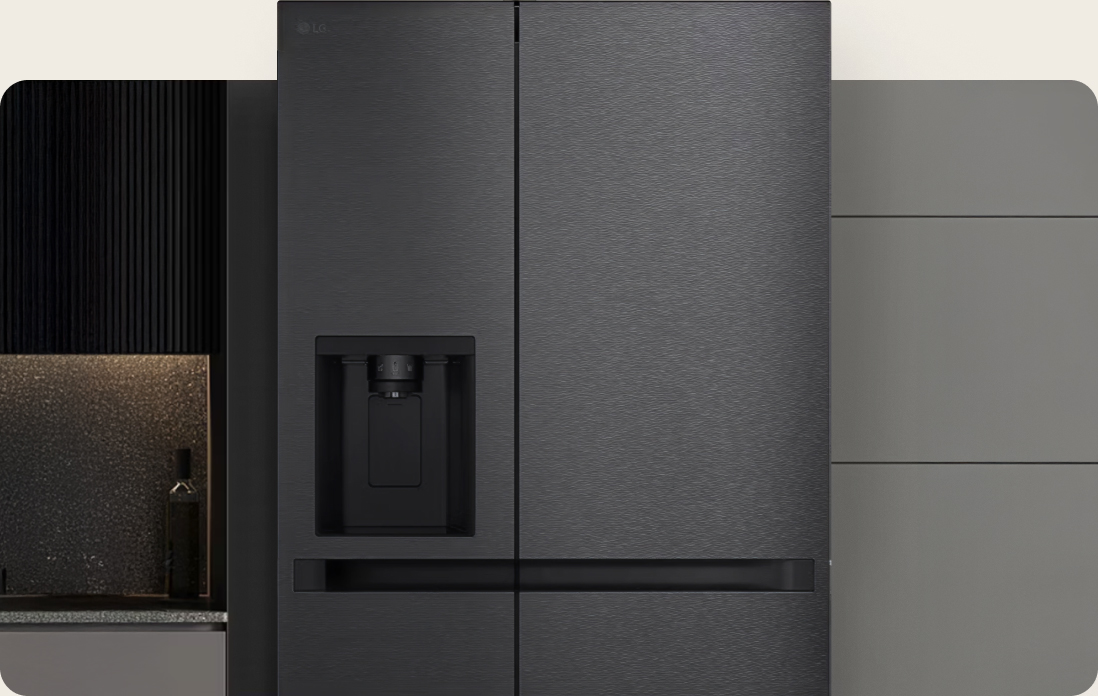 The LG side-by-side fridge freezer close-up with a premium matte black finish integrates seamlessly into a modern kitchen with textured dark cabinets for stylish water and ice dispensers.