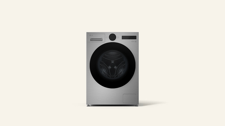 LG black Washer Dryer installed inside a grey-toned cabinet, with a faucet, potted plant, and basket placed above.