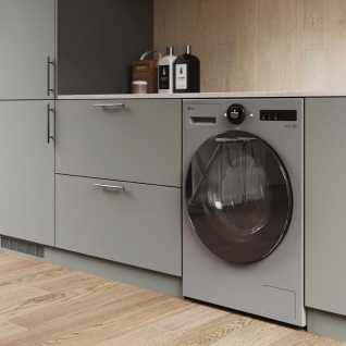 In the laundry room, a silver LG washing machine is placed beside a gray drawer, with detergents stored on top of the drawer.