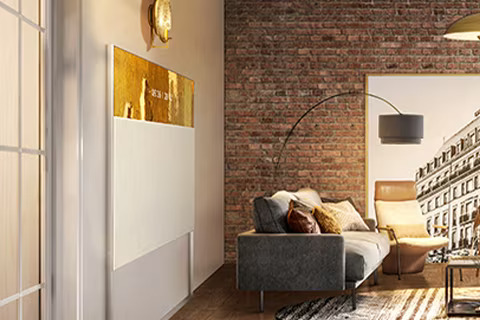 EASEL seen from the side as it sits flush with the wall, blending in with the living room interior.	