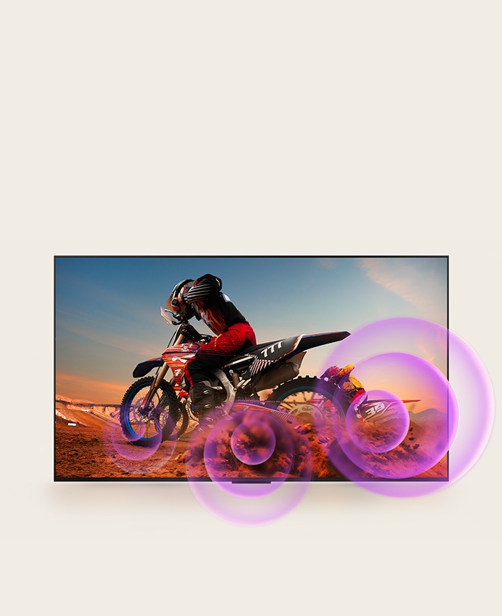 LG QNED TV depicts a man on a motorcycle with purple abstract circles coming out of the wheel to visualize sound emission.