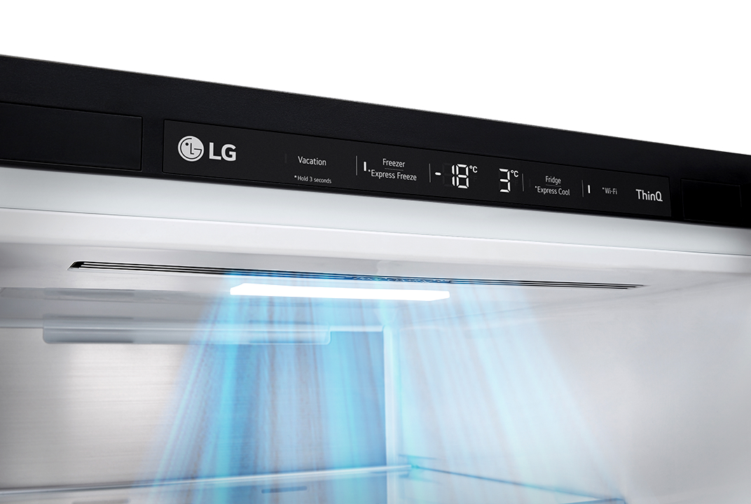 LG refrigerator interior with blue cold air flowing down from the top panel illustrates DoorCooling+.