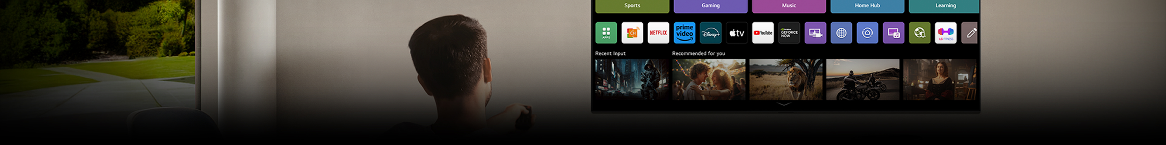 A person sits on the couch holding a remote control. An LG AI TV is mounted on the wall with LG webOS displayed on the screen.