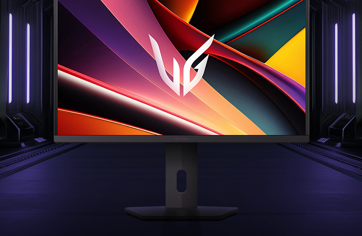 Front view of the LG UltraGear™ 27G610A gaming monitor on its hexagonal base, set in a futuristic, neon-lit corridor; the screen shows vivid purple and red swirls with the UltraGear logo at center.	