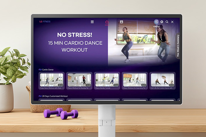 The LG Smart Monitor Swing screen is showing various LG Fitness videos.