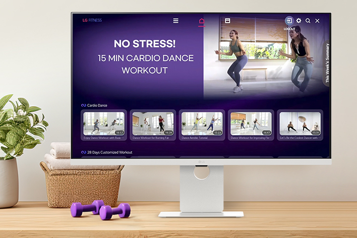 The LG Smart Monitor screen is showing various LG Fitness videos.