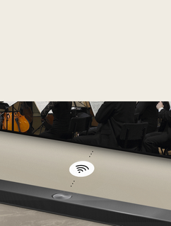 Gros plan sur une barre de son LG sous un téléviseur de LG. Un symbole de connectivité se trouve entre la barre de son LG et un téléviseur de LG, indiquant le fonctionnement sans fil de WOWCAST.