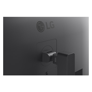 Rear angled view of monitor showing stand and ports (right)