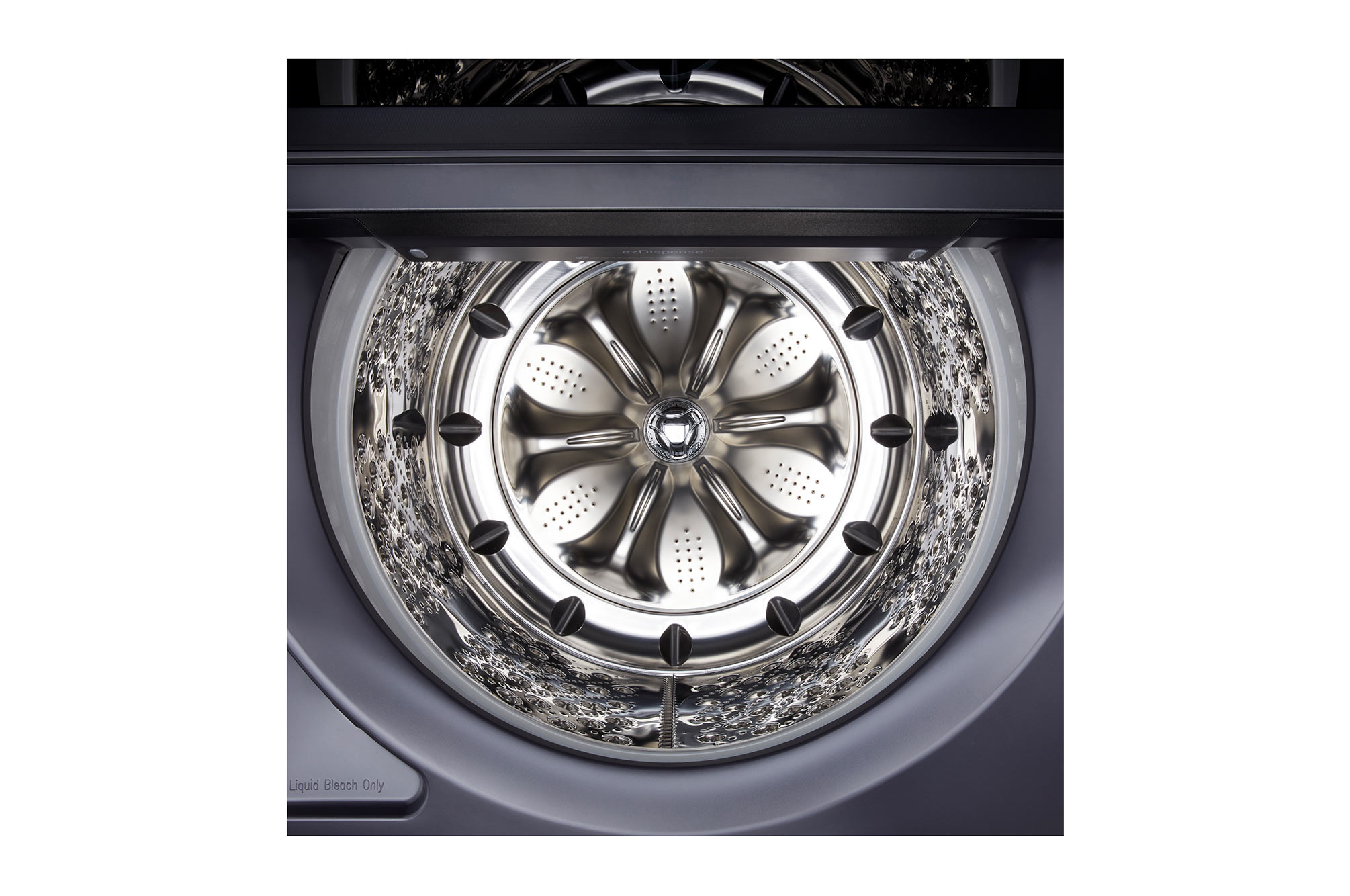 The LG Top Load Washer and Dryer set (WT8600CB) in Black Steel, showcasing the flat-top design and premium finish integrated perfectly beneath the upper cabinetry.