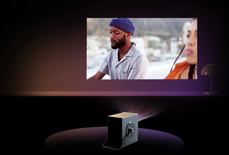 Video of the LG CineBeam Q projector with auto screen adjustment feature