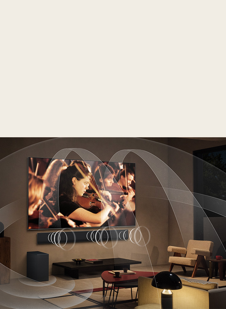 Salon équipé d’un LG OLED TV et LG Soundbar avec des graphiques représentant la façon dont les deux appareils remplissent l’espace avec un son environnement sonore multiple.
