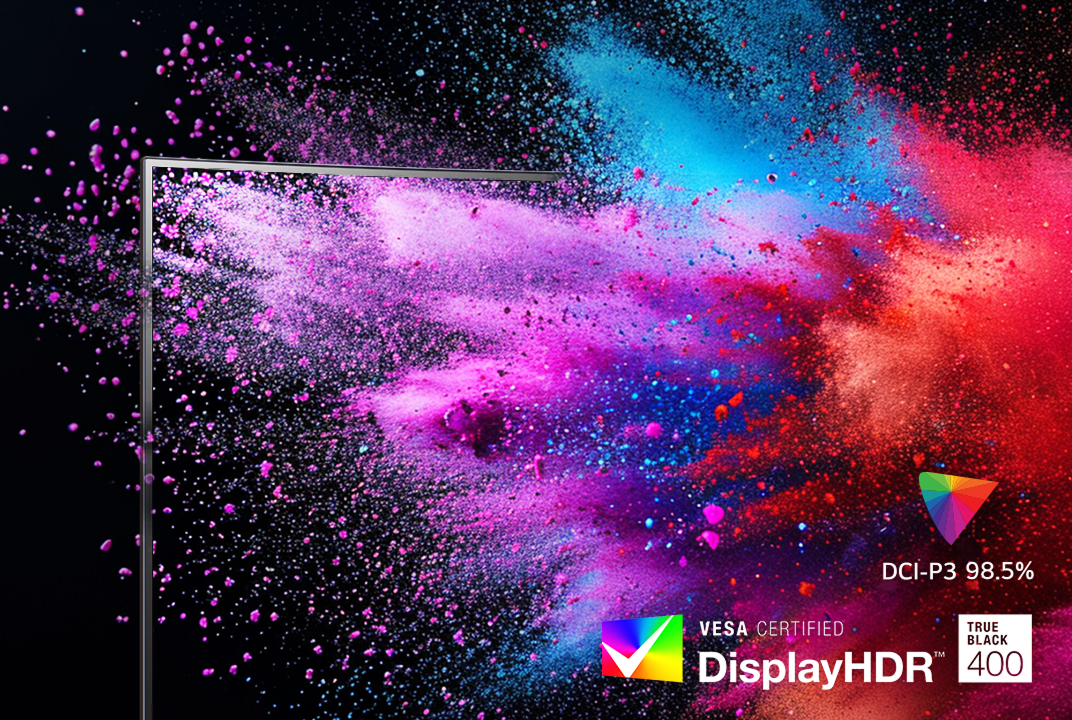 Écran de moniteur LG avec explosions de poudre rose et bleue, illustrant DisplayHDR 400 et DCI-P3.