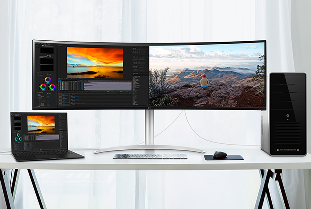 Configuration de moniteur LG avec clavier et souris partagés, illustrant le contrôle KVM.