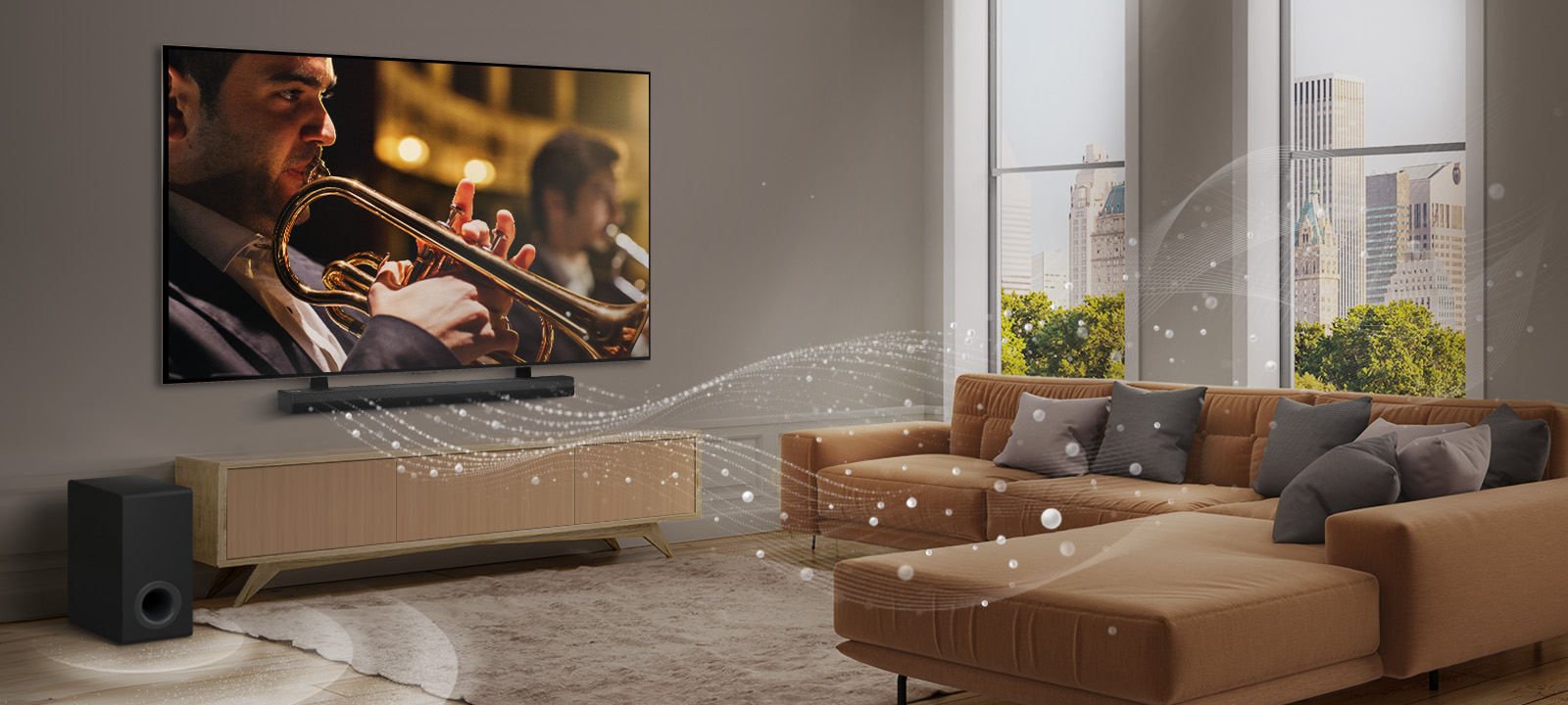 Une barre de son LG, un téléviseur de LG et un caisson de basses se trouvent dans un appartement urbain moderne. La barre de son LG projette trois branches d’ondes sonores composées de gouttelettes blanches qui flottent au-dessus du sol. À côté de la barre de son se trouve un caisson de basses, qui crée un effet sonore à partir du bas. 