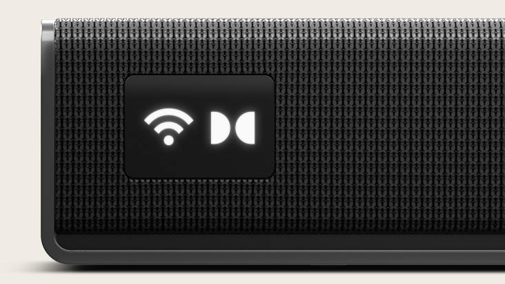 Vue rapprochée de la barre de son H7 du système Sound Suite de LG, dotée d’un écran OLED intelligent pour la commander, avec des icônes Wi-Fi et Dolby Atmos.