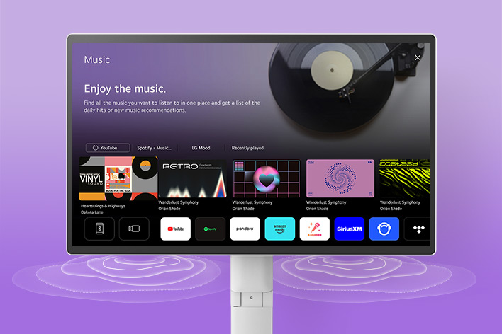 L'écran LG Smart Monitor Swing affiche l'interface des applications musicales.