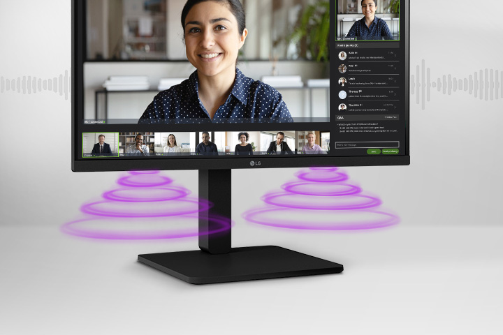 Vue latérale montrant une scène de vidéoconférence sur le moniteur.