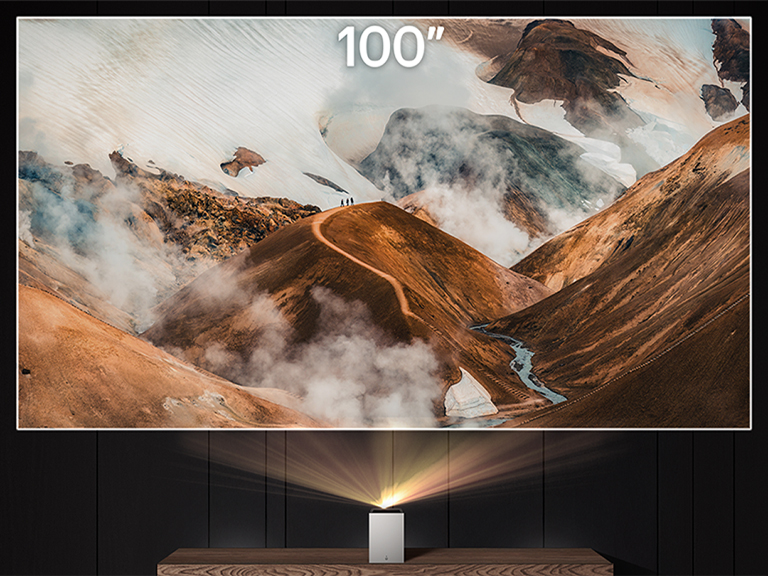 LG CineBeam projecting a cloudy mountain image