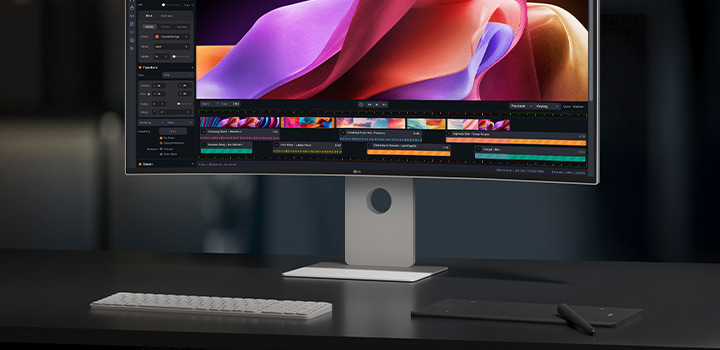 Vue de face du moniteur UltraFine affichant l’image d’une jeune fille, illustrant la précision des couleurs.