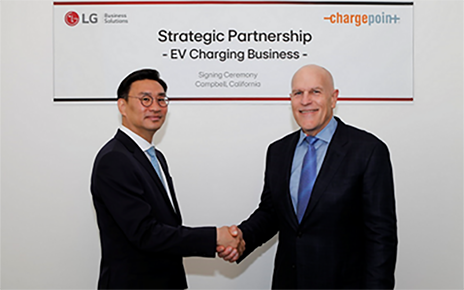 A picture of LG Electronics (left) and ChargePoint (right) representatives shaking hands with each other