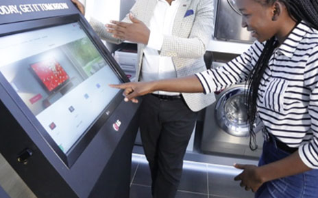 A customer browsing products on a screen at Africa's first-ever digital showroom.