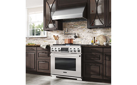 LG's kitchen appliances for the virtual KBIS 2021 displayed in a beautiful home kitchen.