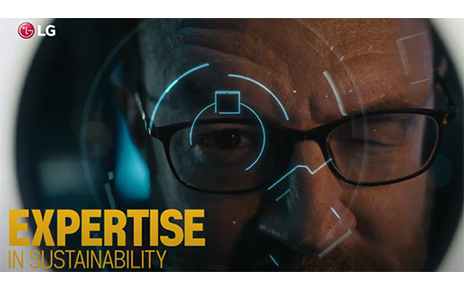 A screenshot from the LG HVAC Solutions YouTube video representing expertise in sustainability with a man looking into a lens as if having his eye scanned.