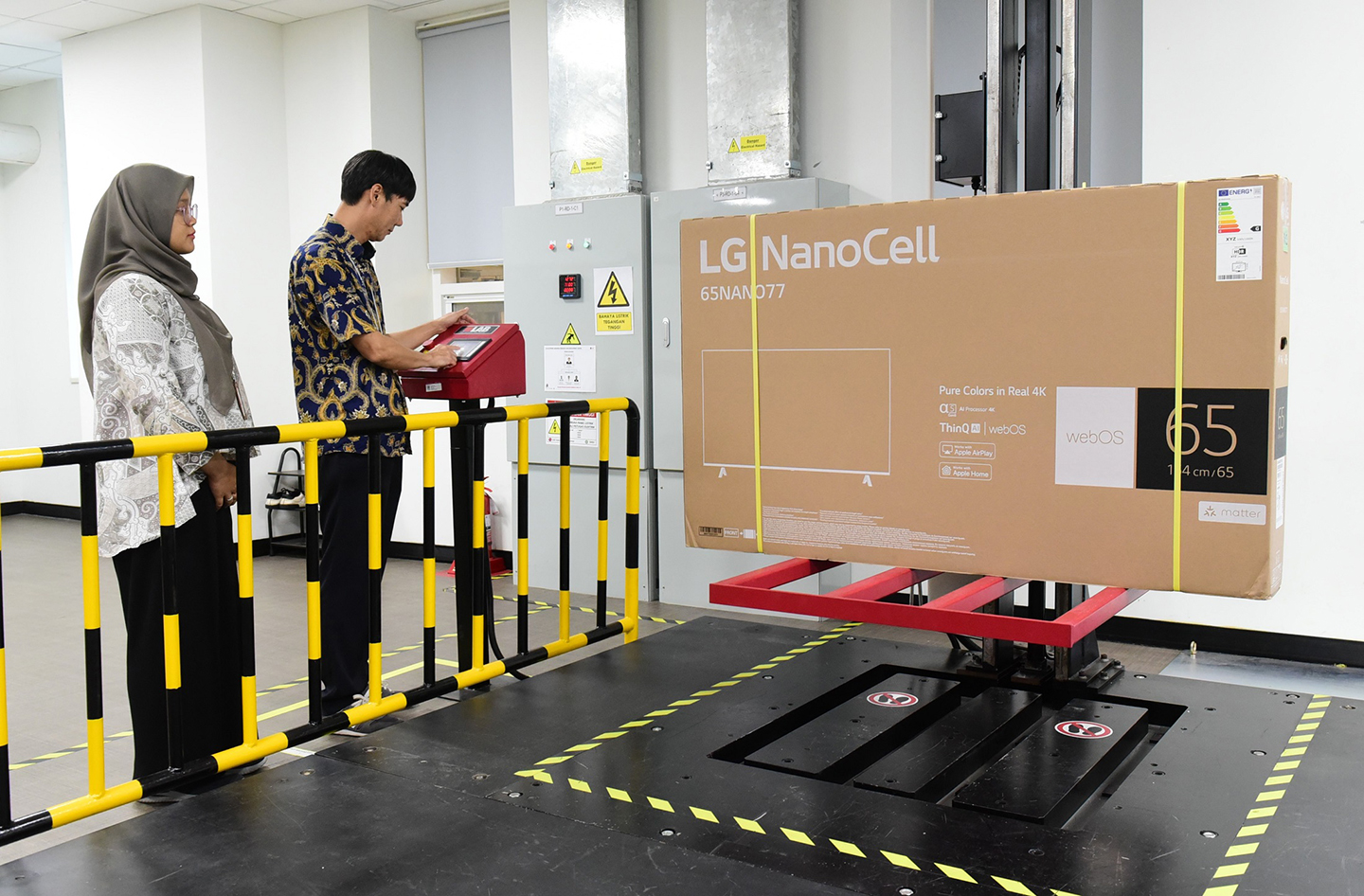 A picture of two people carrying out tests with products