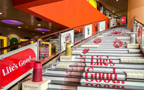 A picture of the Life's Good Zone stairway with multiple products displayed at MegaBox mall