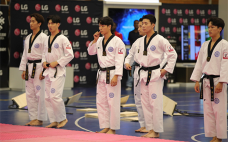 Taekwondo athletes preparing for a performance at the Ambassador's Taekwondo Cup in South Africa