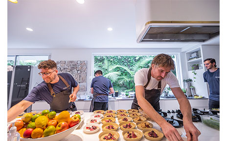Chef Darren Robertson and members of his staff preparing fresh Australian dishes for LG’s Connecting Australia campaign