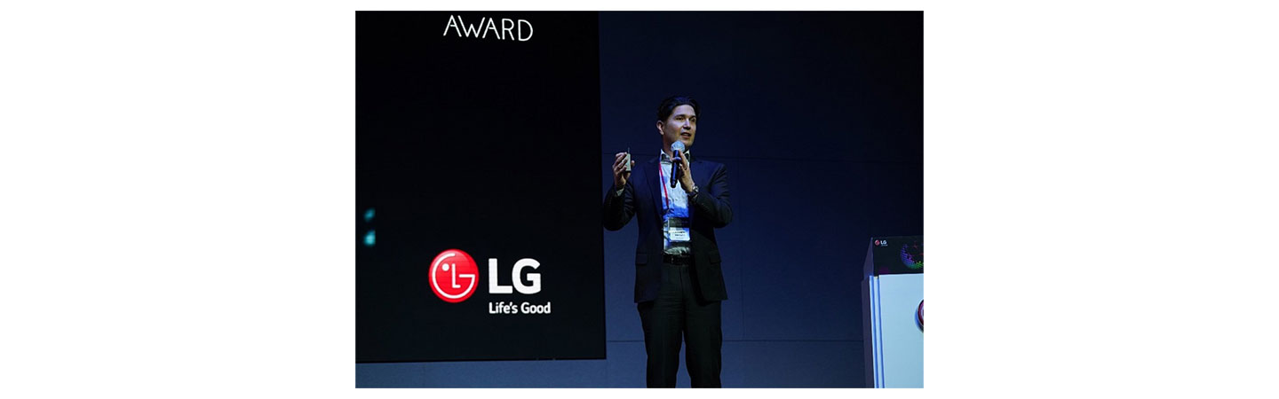 Professor Christopher Marquis of Cambridge Judge Business School giving a lecture on stage during the LIFE’S GOOD AWARD Conference.