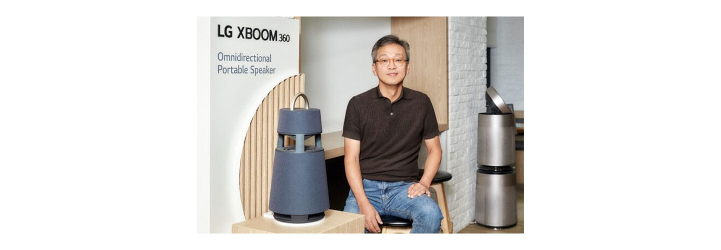 Lee Sam-soo, Chief Digital Officer at LG Electronics, posing in front of LG XBOOM 360 