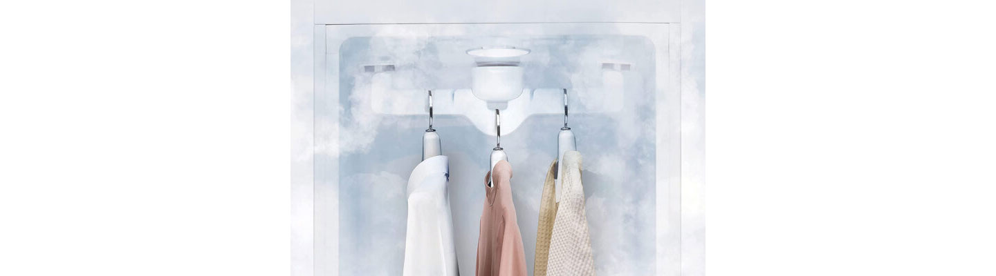 Shirts hanged in the LG Styler being steamed