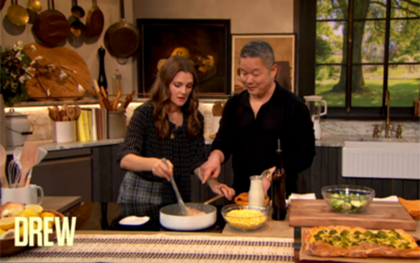 A photo of Drew Barrymore and Danny cooking together