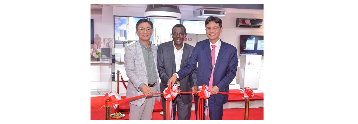 Kim Yong, Kim Sa-nyoung and Dr. Reuben Kivindu cutting the ribbon at LG East Africa’s HVAC showroom.