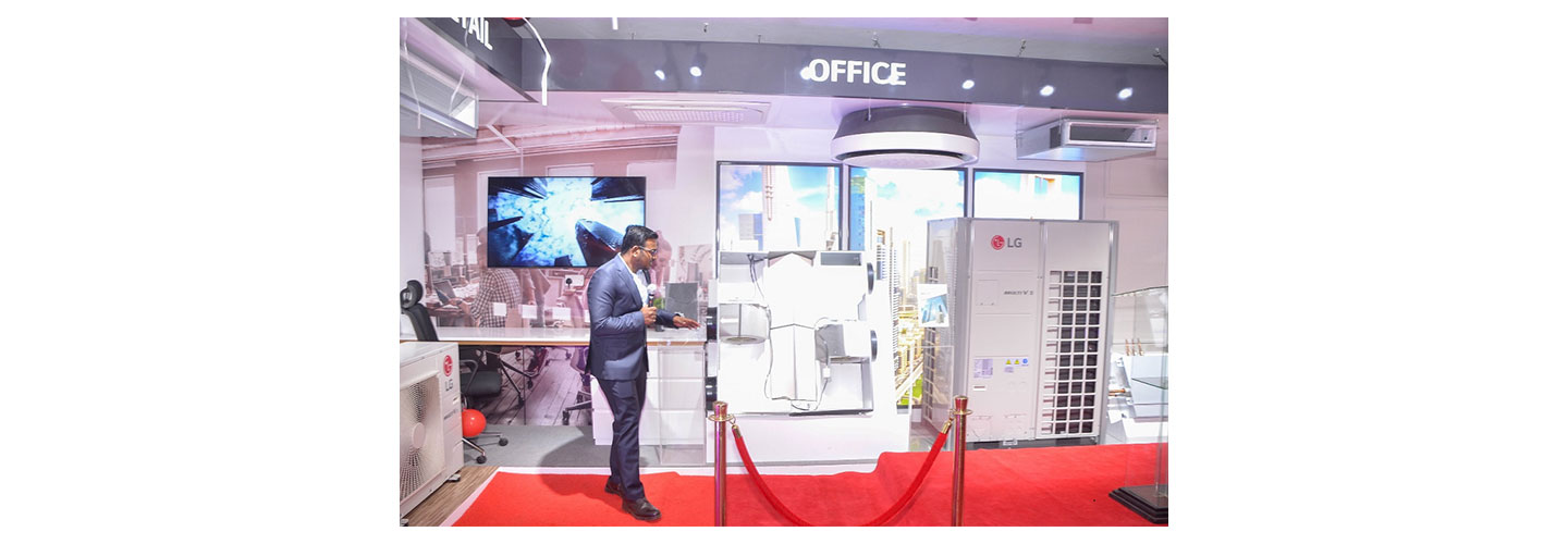 Raja Durai demonstrating LG’s air solution technology at LG East Africa’s HVAC showroom.