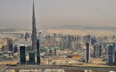 An upper view of Dubai with many buildings including Burj Khalifa, the world's tallest tower