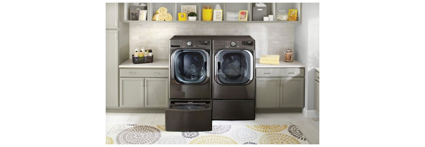 The LG TWINWash pictured in a home, with the LG SideKick washer below opened.