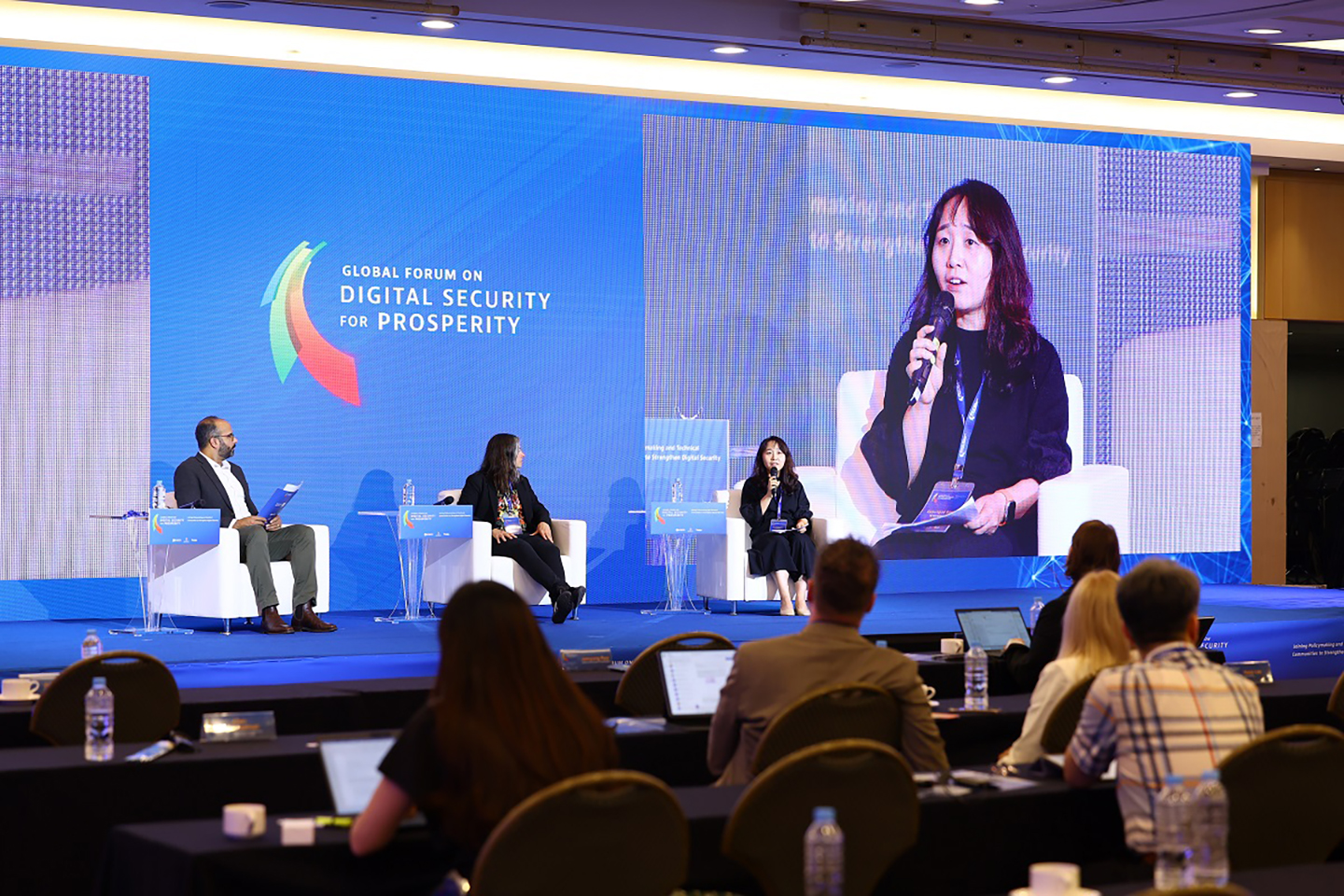 A photo of a panel discussion at the OECD Global Forum on Digital Security for Prosperity in July