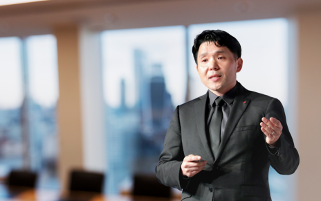 KM Ahn, head of the Design Laboratory, LG Media Entertainment Solution Company at LG Electronics, is speaking with a blurred background.