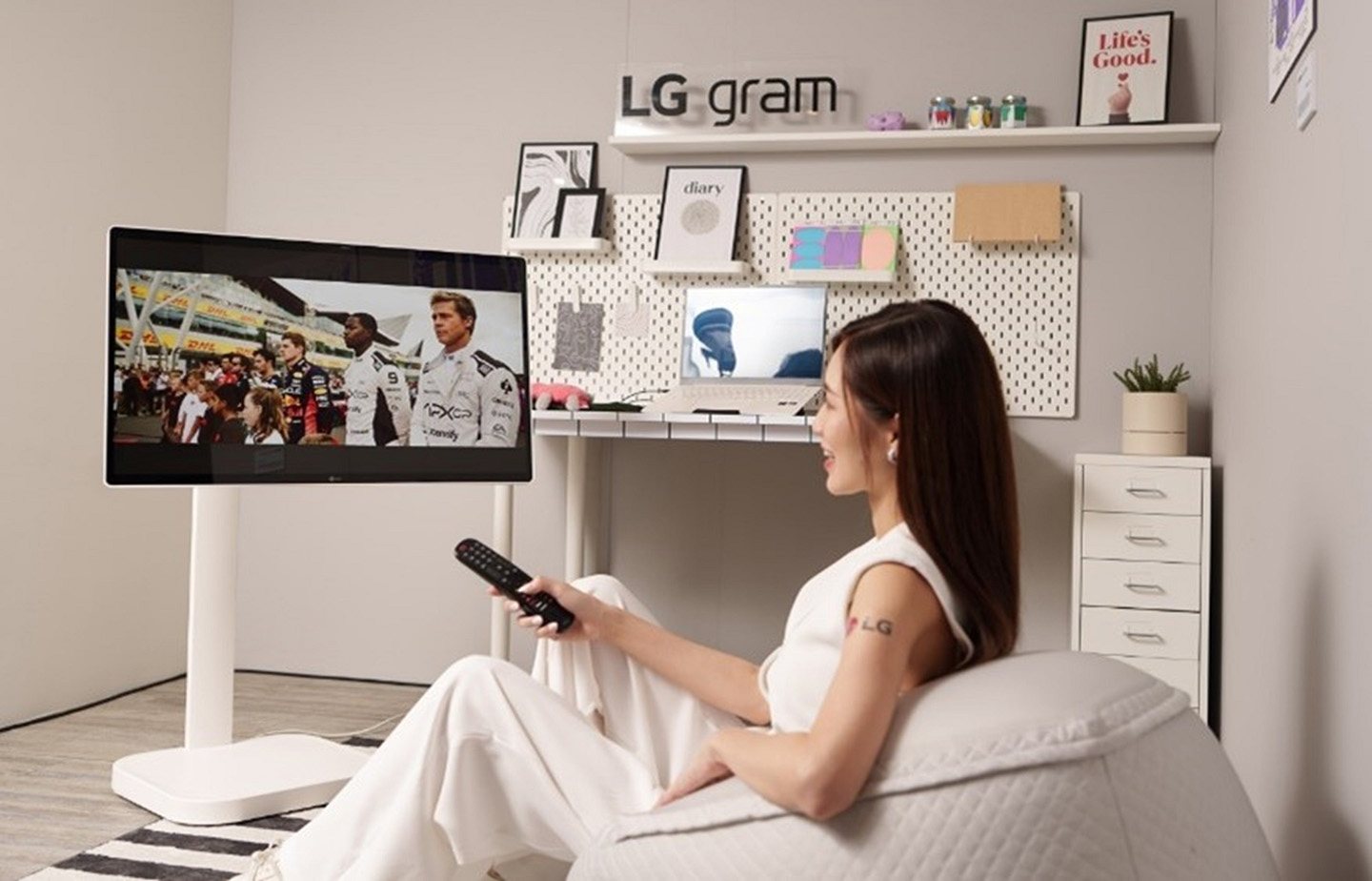 A photo of a woman watching a movie in a room